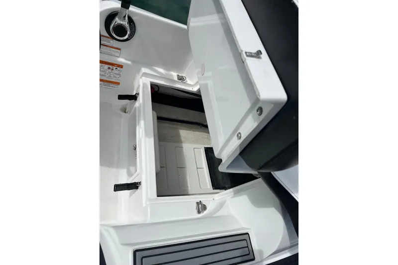 Slide: The Image of Open storage compartment in 2020 Walker Bay Generation 360 boat interior. - 9