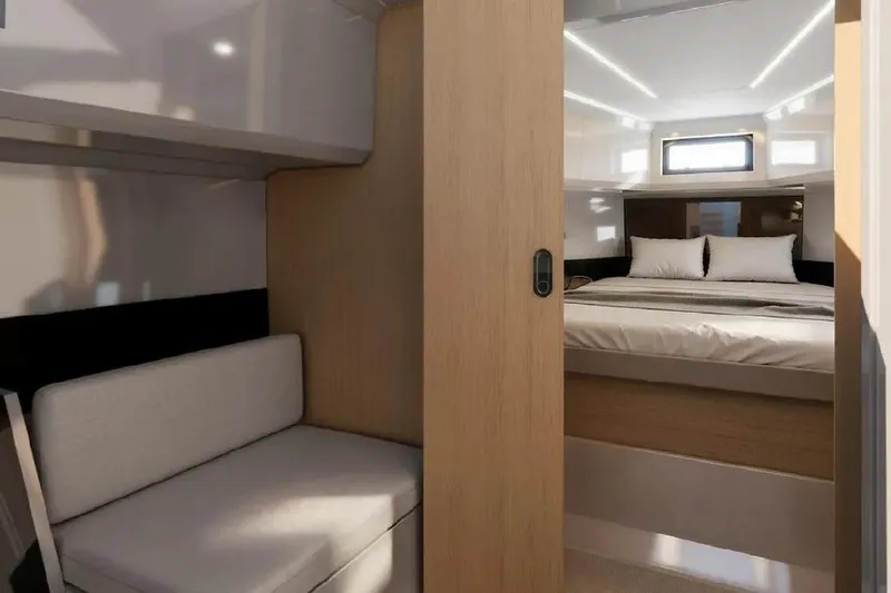 Slide: The Image of Interior of De Antonio Yachts D36 CABIN 2026 with bed and seating area. - 10