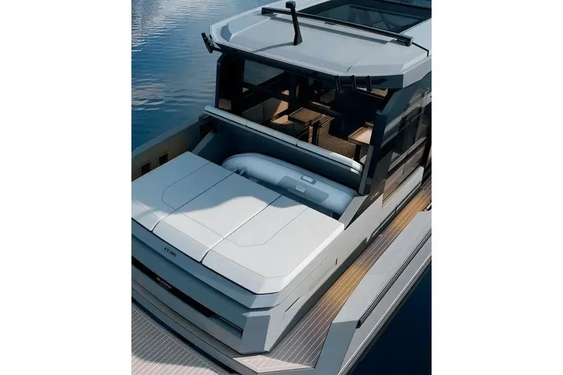 Slide: The Image of De Antonio Yachts D36 CABIN 2026 on calm water. - 7