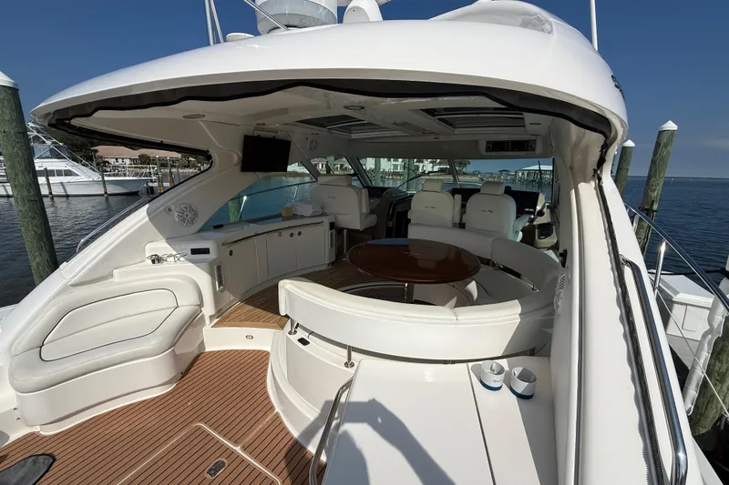 Slide: The Image of Luxurious 2008 Sea Ray 550 Sundancer yacht interior with elegant seating and wood flooring. - 2