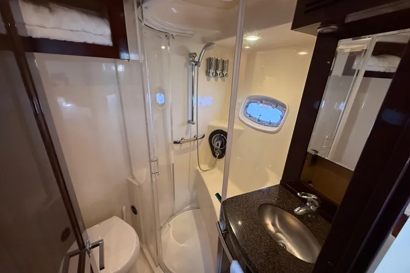 Slide: The Image of Luxurious bathroom in 2008 Sea Ray 550 Sundancer yacht with shower and sink. - 9