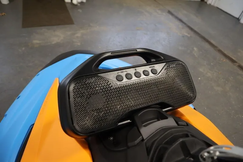 Slide: The Image of Sea-Doo Spark Trixx 2025 with speaker on blue and orange design. - 10