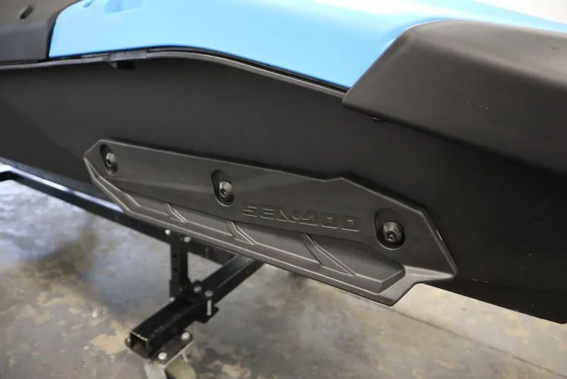 Slide: The Image of 2025 Sea-Doo Spark Trixx side view, blue and black design. - 17