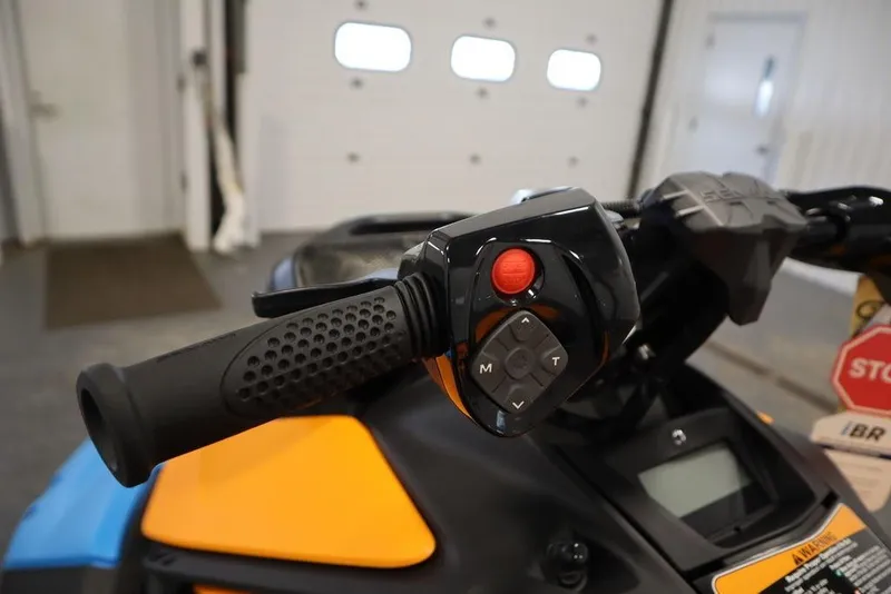 Slide: The Image of Handlebar of 2025 Sea-Doo Spark Trixx with control buttons. - 9