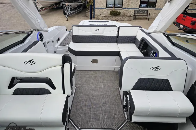 Slide: The Image of 2017 Monterey 298SS Super Sport boat interior with white and black seating. - 104