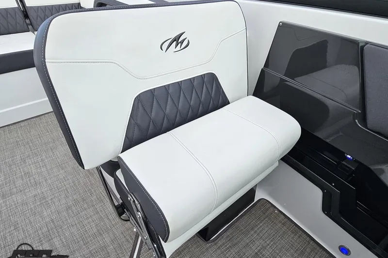 Slide: The Image of 2017 Monterey 298SS Super Sport boat seat with white and black upholstery. - 106