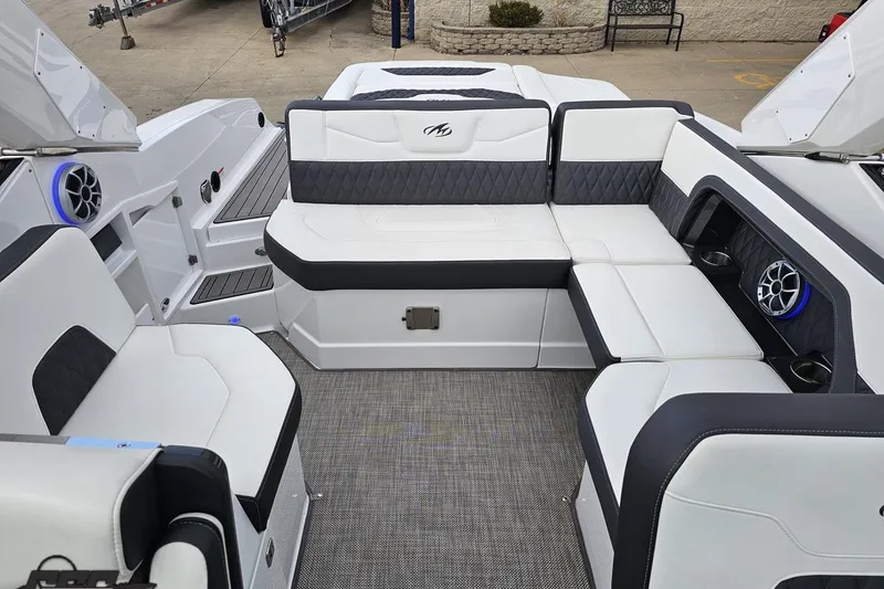 Slide: The Image of Luxurious seating on 2017 Monterey 298SS Super Sport boat with modern design and speakers. - 111