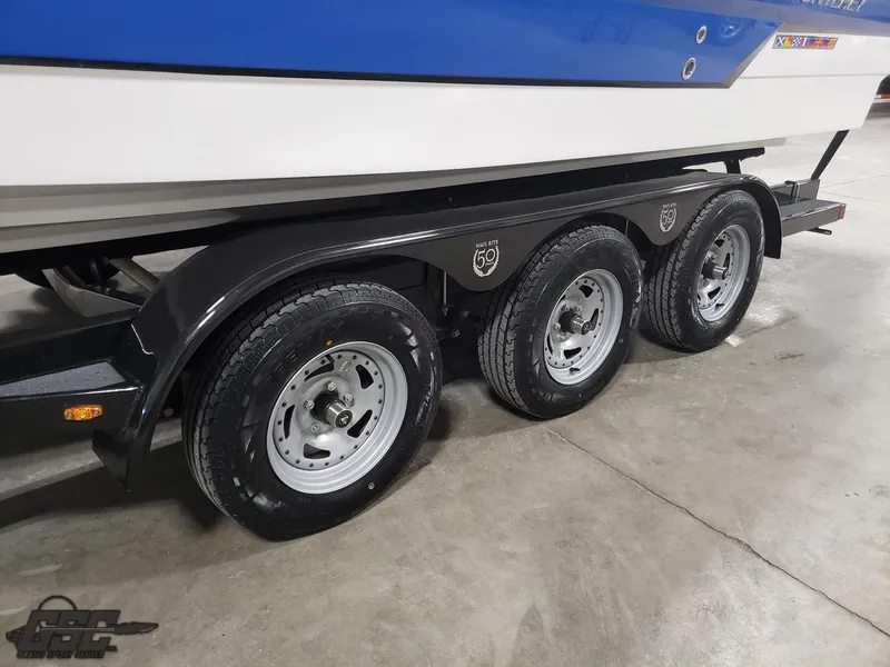 Slide: The Image of 2017 Monterey 298SS Super Sport on a triple-axle trailer. - 12