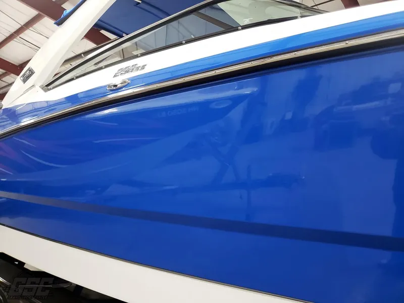 Slide: The Image of 2017 Monterey 298SS Super Sport boat, blue side view. - 24