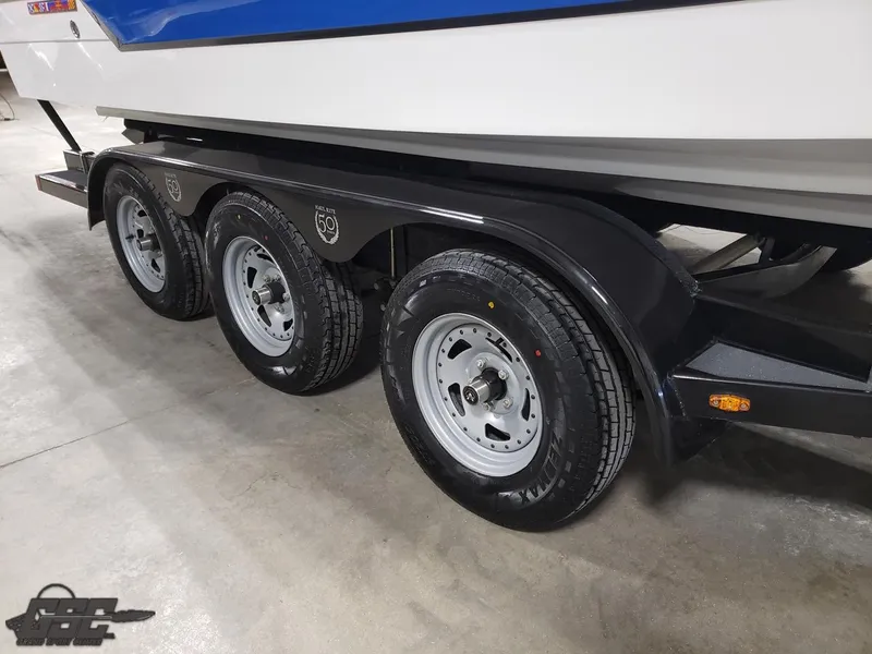Slide: The Image of 2017 Monterey 298SS Super Sport on a triple-axle trailer. - 27