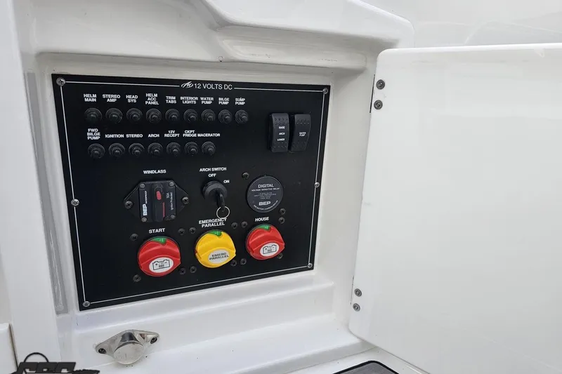 Slide: The Image of Control panel of a 2017 Monterey 298SS Super Sport boat with various switches and indicators. - 58