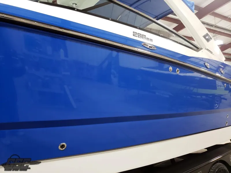 Slide: The Image of 2017 Monterey 298SS Super Sport boat, blue side view. - 9