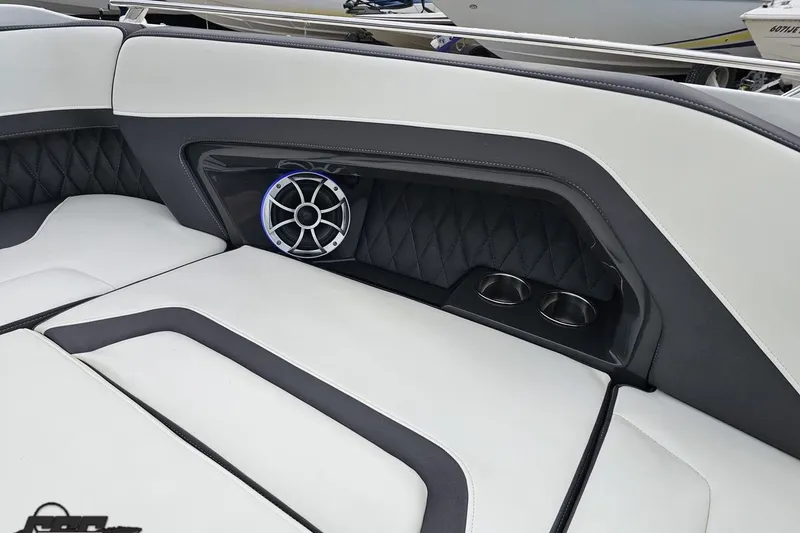 Slide: The Image of 2017 Monterey 298SS Super Sport boat interior with speaker and cup holders. - 91