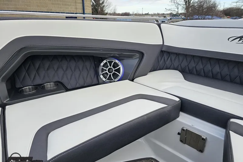 Slide: The Image of Luxurious interior of 2017 Monterey 298SS Super Sport boat with speaker and cup holders. - 95