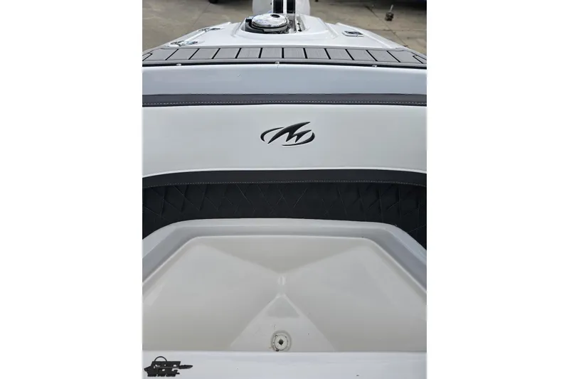 Slide: The Image of 2017 Monterey 298SS Super Sport boat interior with logo and seating area. - 99