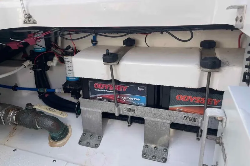 Slide: The Image of 2013 Everglades 355 Center Console boat battery compartment with Odyssey marine batteries. - 10