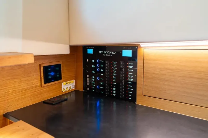Slide: The Image of De Antonio Yachts D42 2026 interior control panel. - 23