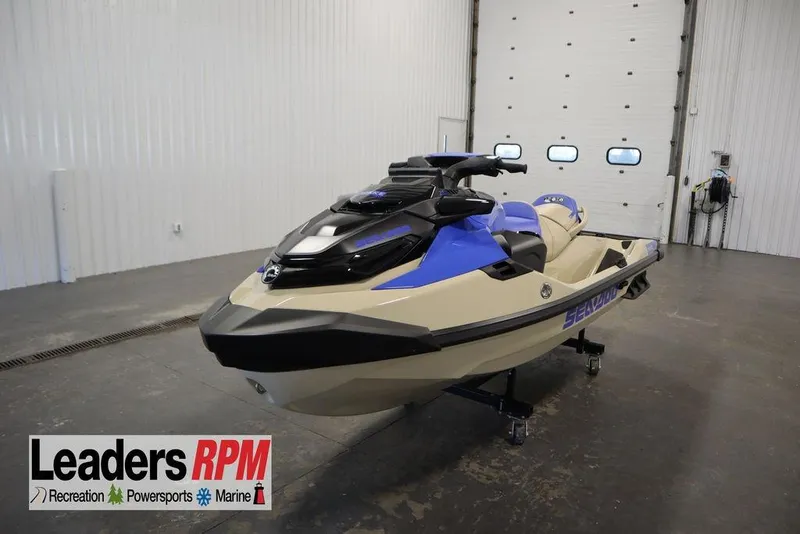 The Image of 2025 Sea-Doo Wake Pro 230 jet ski in showroom, featuring sleek design and vibrant colors. - 0