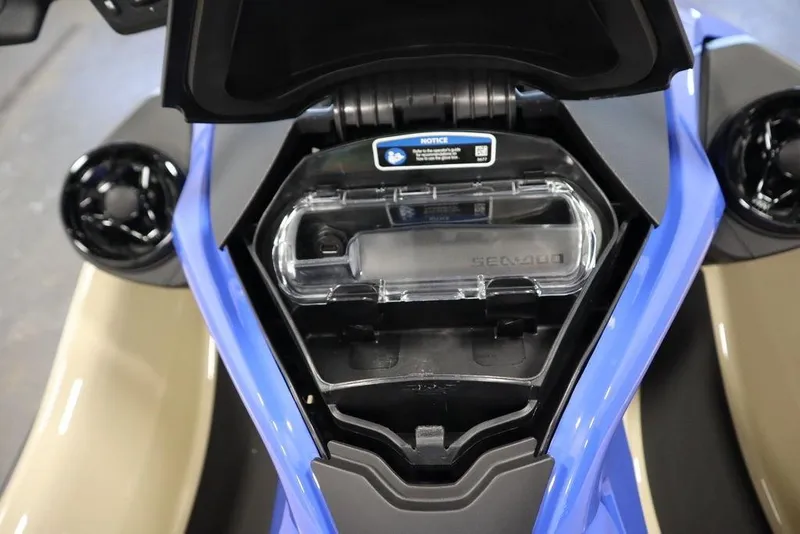 Slide: The Image of 2026 Sea-Doo Wake Pro 230 storage compartment, open view, showcasing interior design. - 20