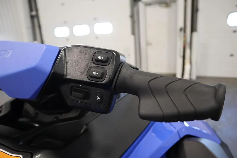 Slide: The Image of 2026 Sea-Doo Wake Pro 230 handlebars and dashboard in a garage setting. - 9