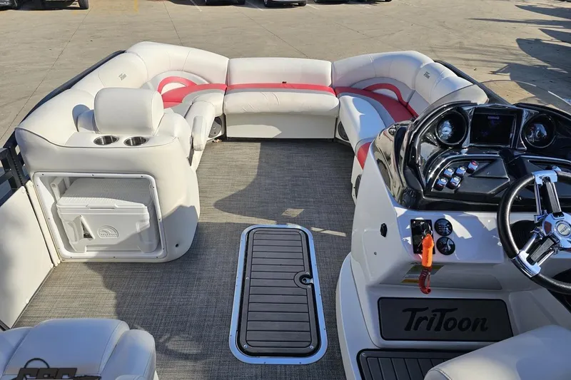 Slide: The Image of 2019 JC Tritoon Neptoon 25 Sport SL interior with plush seating and modern dashboard. - 61