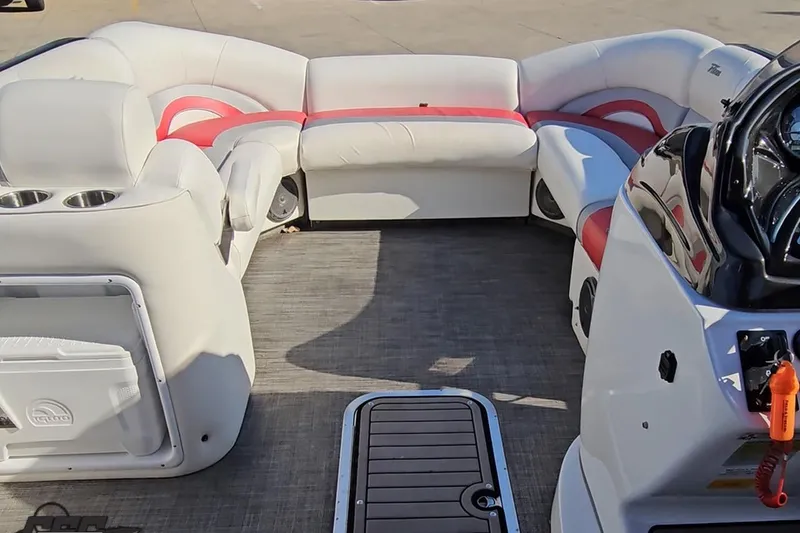 Slide: The Image of Interior of 2019 JC Tritoon Neptoon 25 Sport SL with white and red seating. - 66