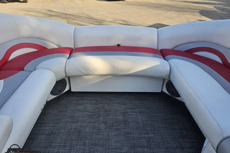 Slide: The Image of 2019 JC Tritoon Neptoon 25 Sport SL interior with red and gray seating. - 67