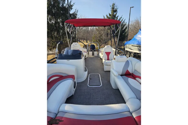 Slide: The Image of 2019 JC Tritoon Neptoon 25 Sport SL with red canopy and spacious seating. - 17