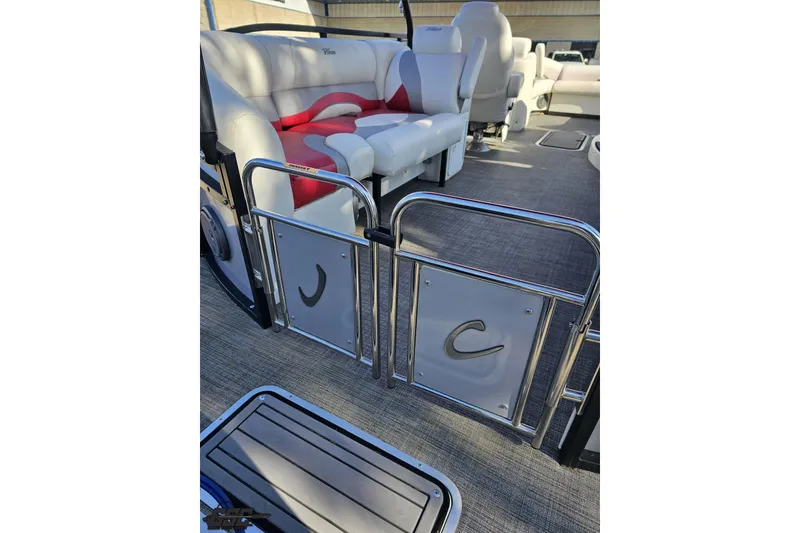 Slide: The Image of 2019 JC Tritoon Neptoon 25 Sport SL interior with plush seating and sleek design. - 46