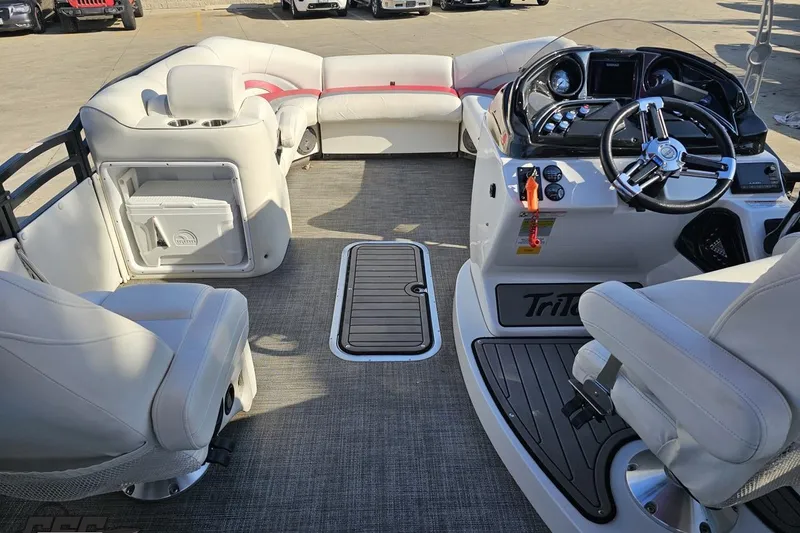 Slide: The Image of Interior of a 2019 JC Tritoon Neptoon 25 Sport SL boat with seating and helm. - 52