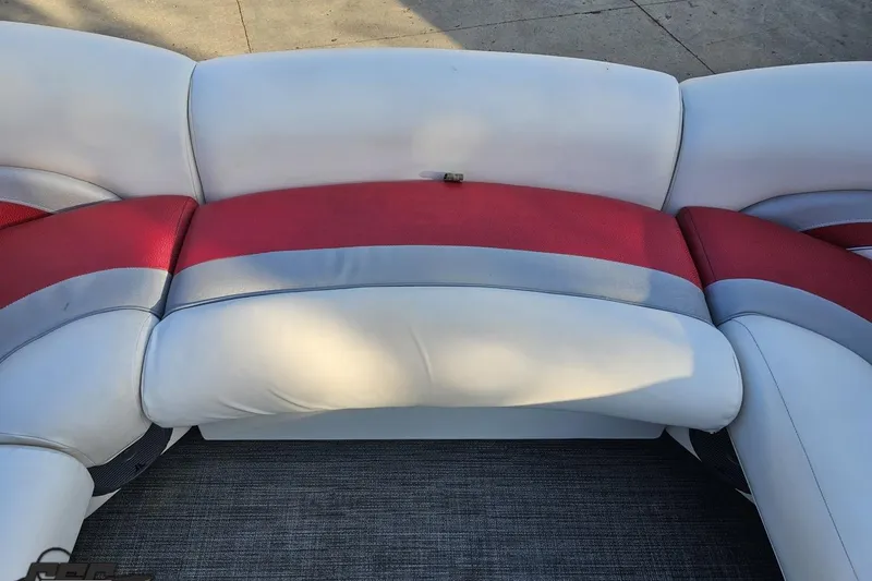 Slide: The Image of 2019 JC Tritoon Neptoon 25 Sport SL boat seating, red and white upholstery. - 68