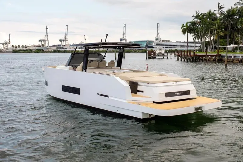 Slide: The Image of De Antonio Yachts D42 2026 anchored on calm waters. - 3