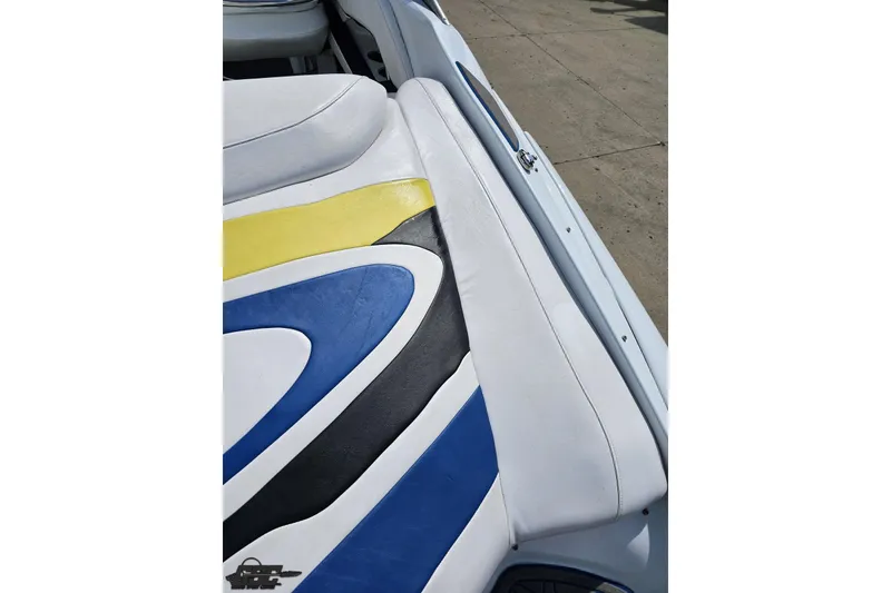 Slide: The Image of 2005 Baja 275 boat interior with colorful seat design. - 38