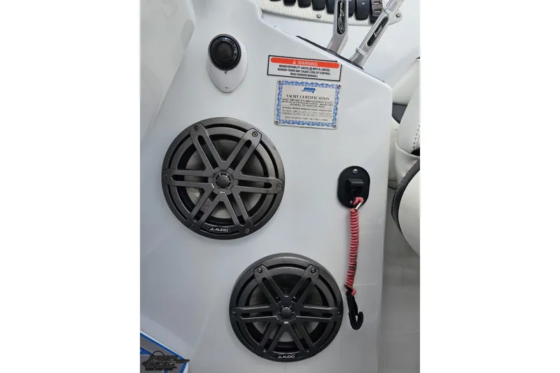 Slide: The Image of Interior of 2005 Baja 275 boat featuring JL Audio speakers and yacht certification. - 69