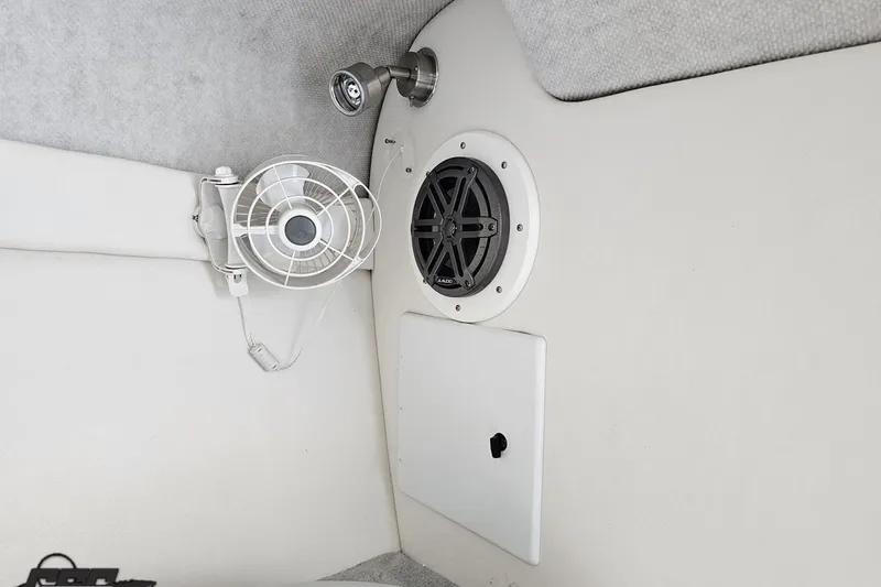 Slide: The Image of 2005 Baja 275 interior with fan, speaker, and light fixture. - 76
