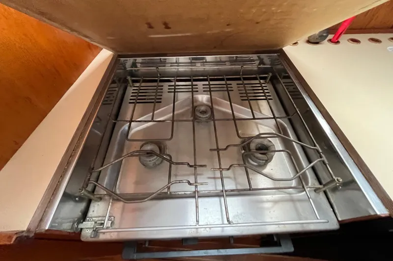 Slide: The Image of Stainless steel stove in 1986 Nauticat 33' sailboat galley. - 43