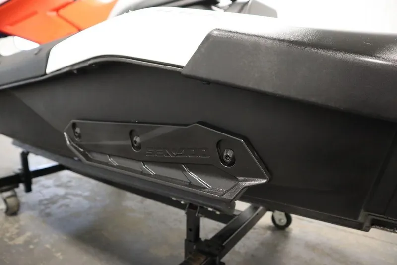 Slide: The Image of 2025 Sea-Doo Spark Trixx for 1, black side view on stand. - 16