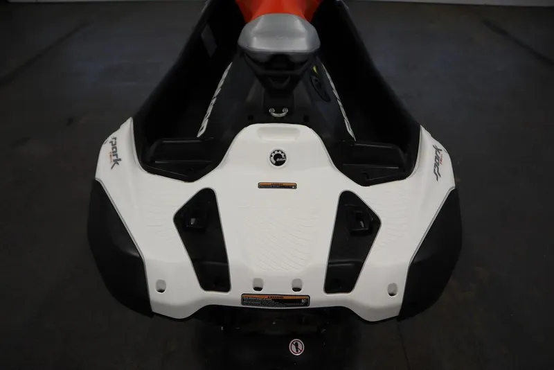 Slide: The Image of 2025 Sea-Doo Spark Trixx for 1, rear view, showcasing sleek design and branding. - 19