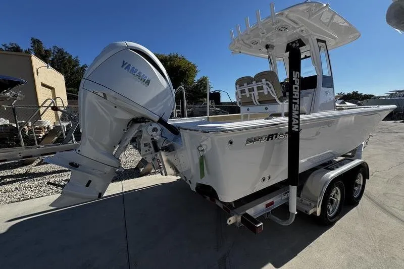 Slide: The Image of 2026 Sportsman Masters 247OE Bay Boat on trailer, featuring Yamaha outboard engine. - 4