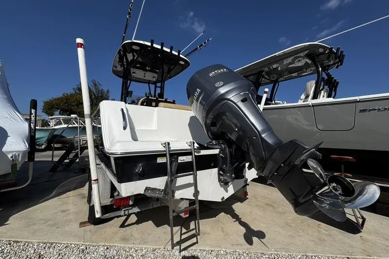 Slide: The Image of 2026 Sportsman Open 232 Center Console boat with Yamaha outboard motor. - 6