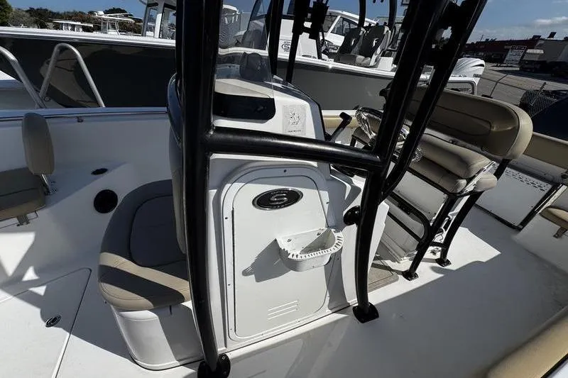 Slide: The Image of 2026 Sportsman Open 232 Center Console boat interior with seating and console details. - 9