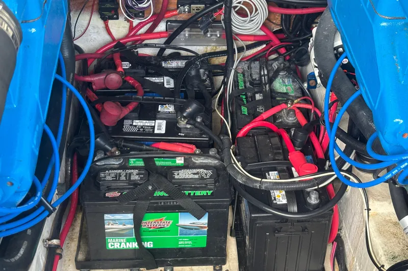 Slide: The Image of Battery compartment of a 1998 Tiara Yachts 2900 Coronet with multiple marine batteries. - 16