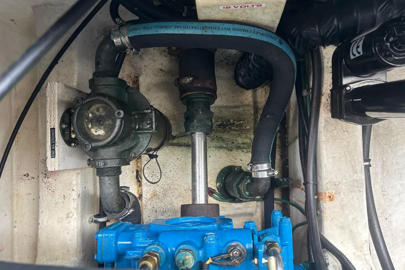 Slide: The Image of Engine compartment of a 1998 Tiara Yachts 2900 Coronet, showcasing mechanical components. - 17