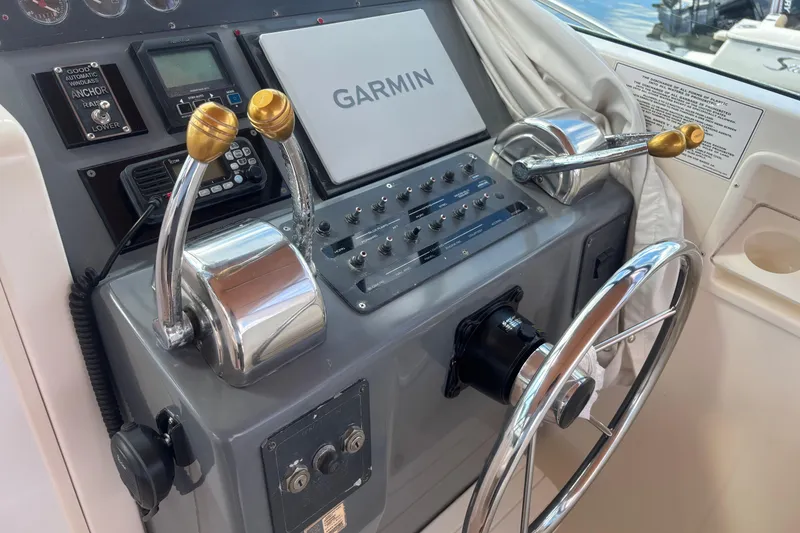 Slide: The Image of 1998 Tiara Yachts 2900 Coronet helm with Garmin navigation and control panel. - 3