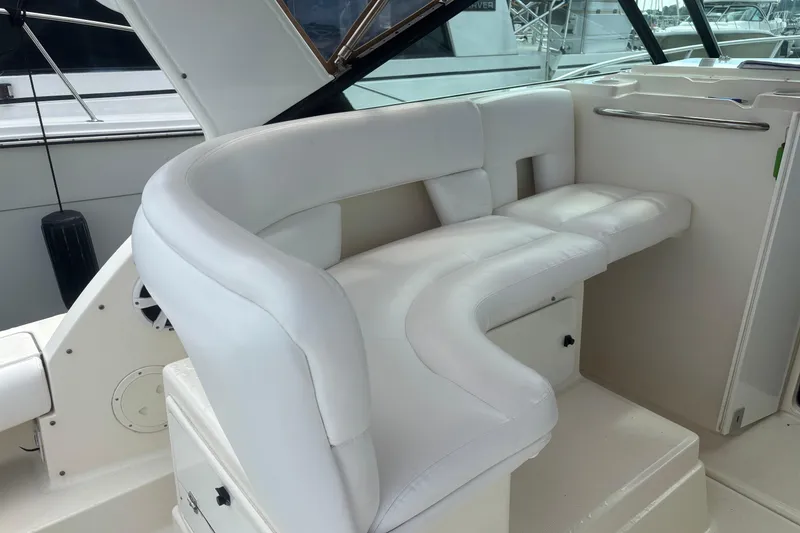 Slide: The Image of 1998 Tiara Yachts 2900 Coronet interior with white leather seating. - 36