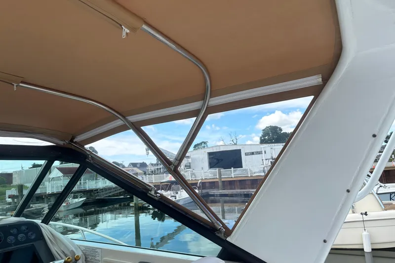 Slide: The Image of Interior view of 1998 Tiara Yachts 2900 Coronet with marina background. - 38