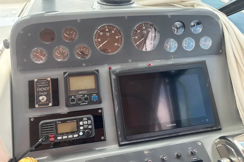 Slide: The Image of Dashboard of a 1998 Tiara Yachts 2900 Coronet with gauges and navigation equipment. - 4