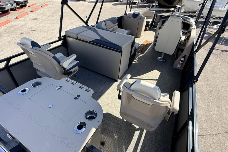 Slide: The Image of 2026 Avalon LSZ Rear Fish 24' pontoon boat interior with seating and fishing station. - 11