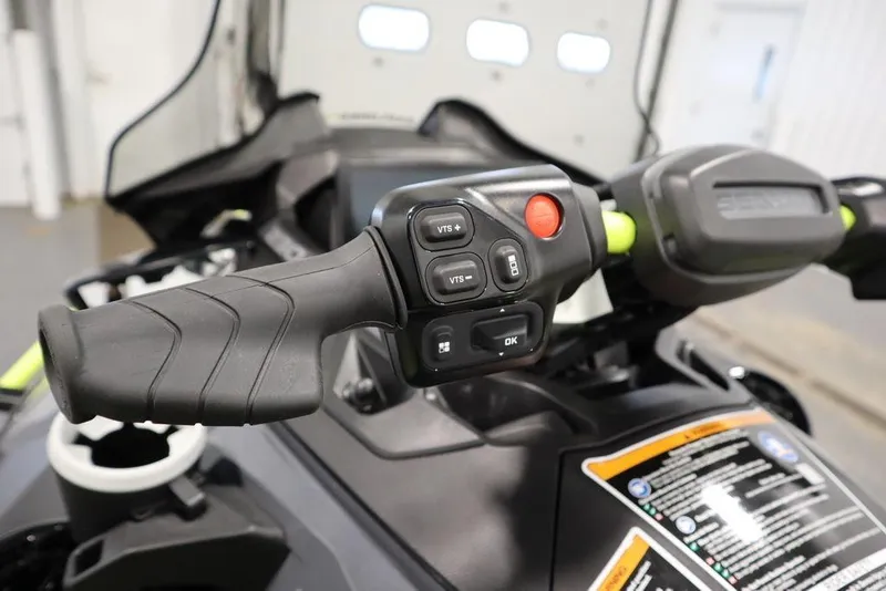 Slide: The Image of 2026 Sea-Doo Explorer Pro 170 handlebar controls with buttons and grip detail. - 12