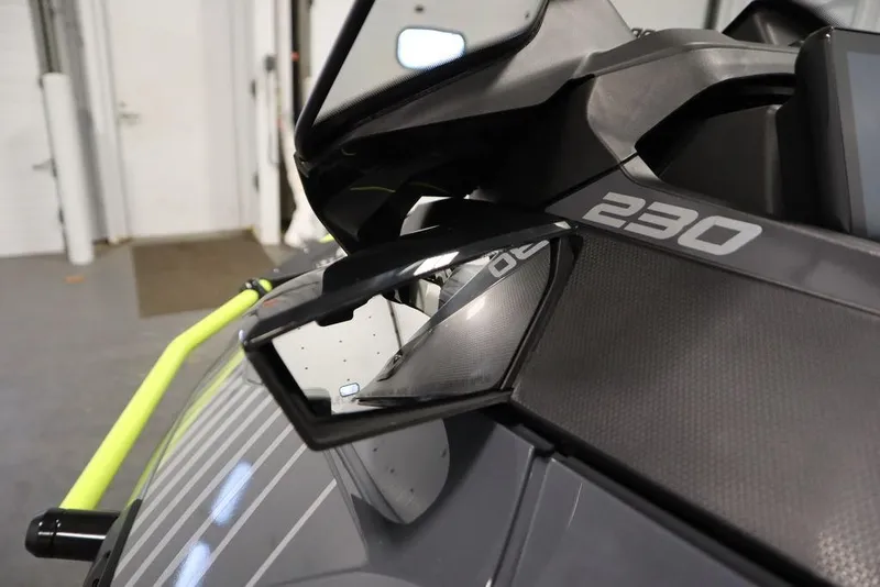Slide: The Image of 2026 Sea-Doo Explorer Pro 170, close-up of side mirror and body detailing. - 13